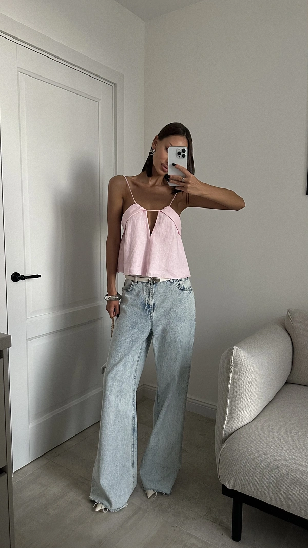 Джинсы с необработанной линией края